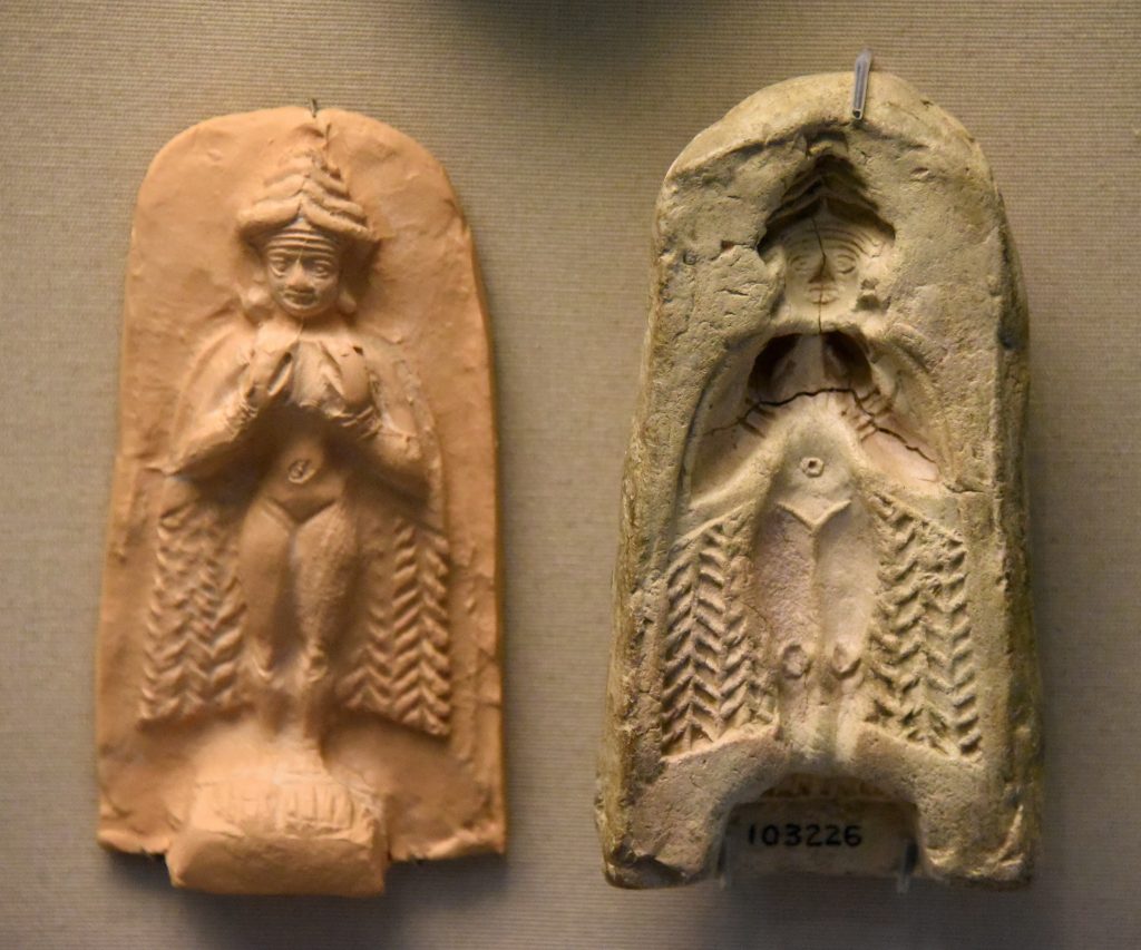 This is a fired clay mould for the goddess Ishtar. The goddess is depicted nude. She holds her breasts with her hands and wears a horned crown. She has a pair of wings (or a cloak) and her feet are talon-like. On the left is the modern impression of the mould. Old Babylonian Period, 2000-1750 BCE. From Southern Mesopotamia, modern-day Iraq. (The British Museum, London).